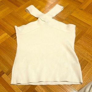 White top with cross neck design